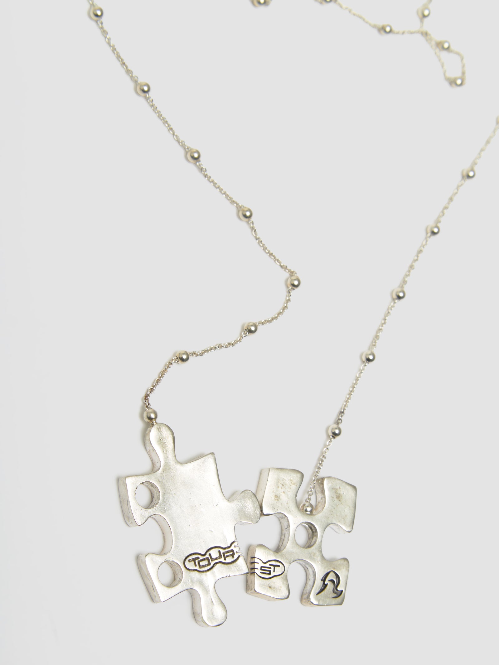 ASTERISK CANDLEHOLDER NECKPIECE